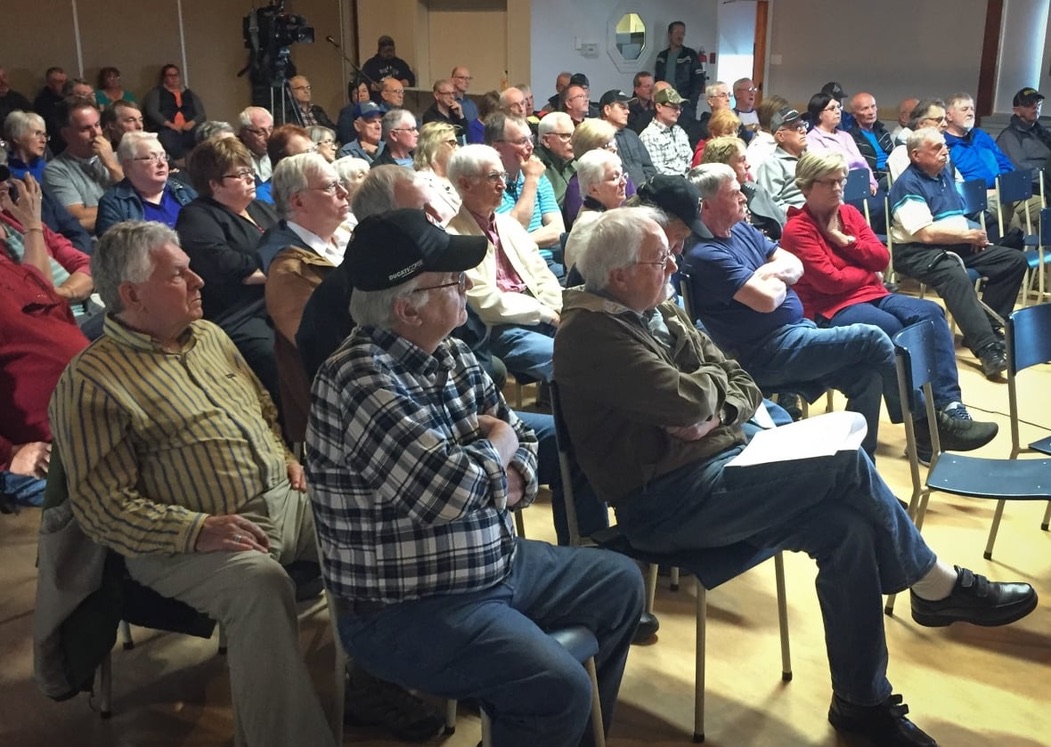 <i>About 85 people attended the meeting to grill officials from Donkin mine, the Department of Transportation and Seaboard, which is the contractor hauling coal through Port Morien. (Tom Ayers/CBC)</i>